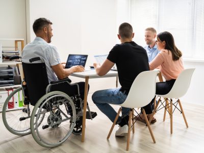 Disabled,People,In,Wheelchair,At,Workplace,Business,Meeting